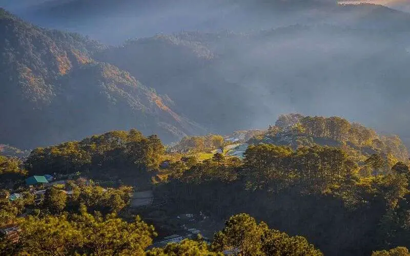 Sagada Mountains, a majestic landscape of towering peaks and lush greenery.