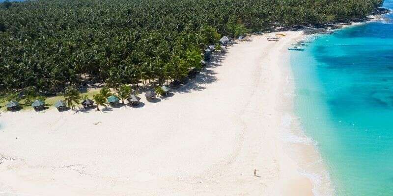 Photo of Beach in Daku Island, Siargao, Mindanao Tourist Spots