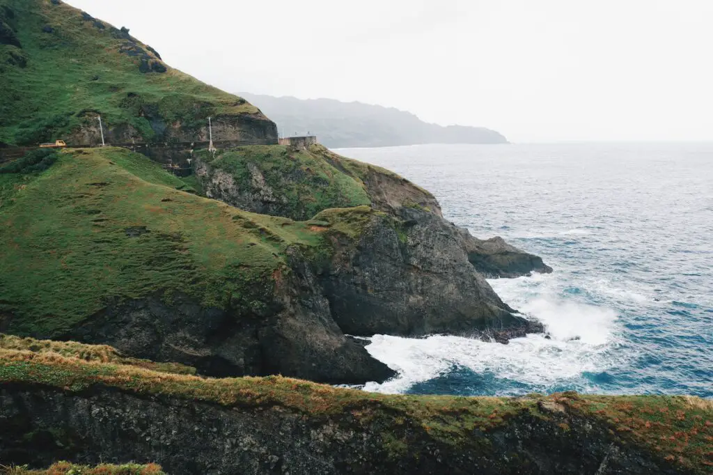 aerial photography of green island surrounded of body of water in Batanes