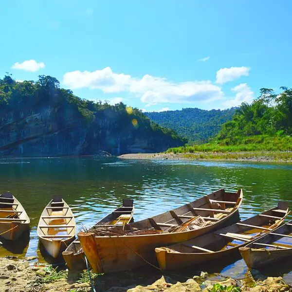 Serene view of parked boats alongside Governer's Rapids in Quirino.