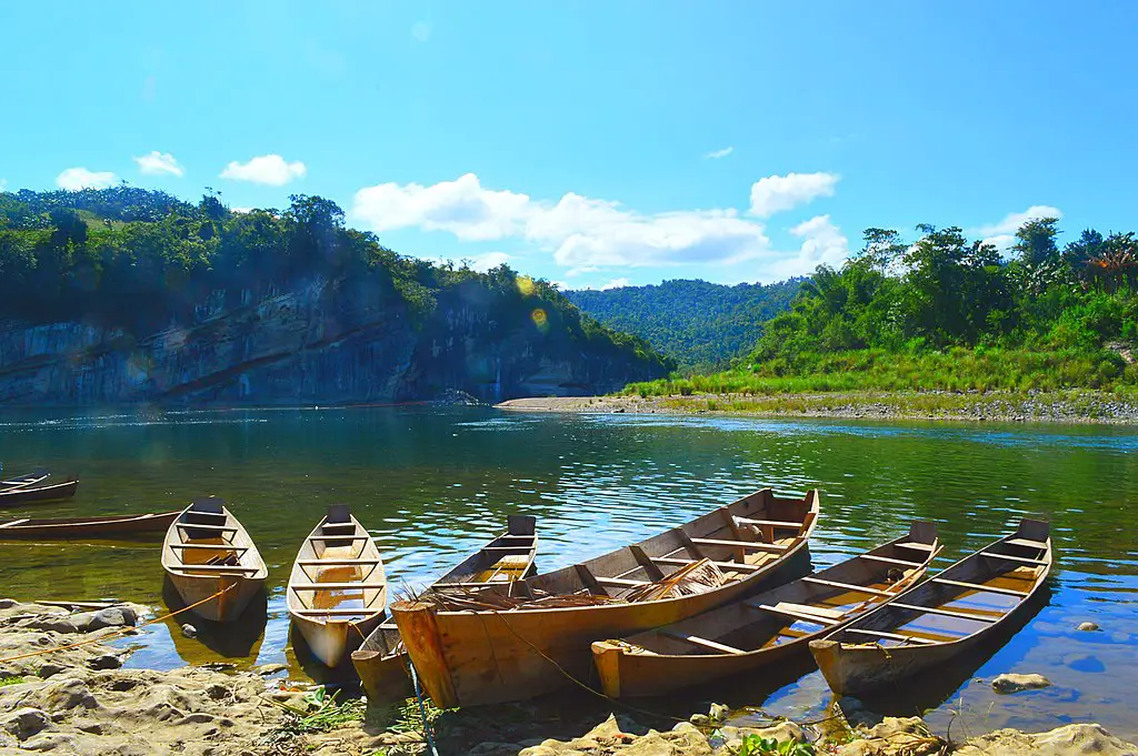 Serene view of parked boats alongside Governer's Rapids in Quirino.